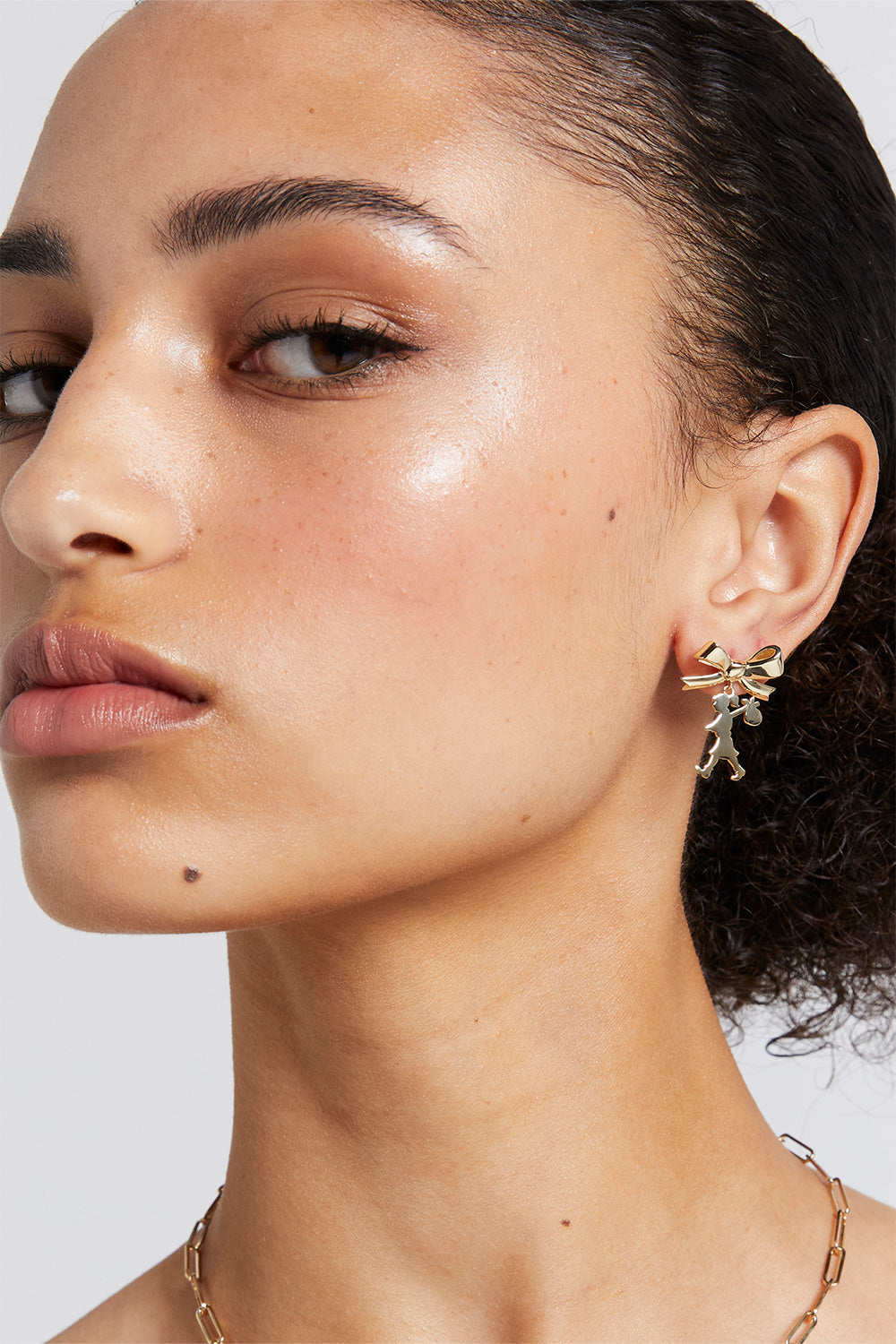 Girl with the Bow Earrings Gold – Karen Walker - Main Image