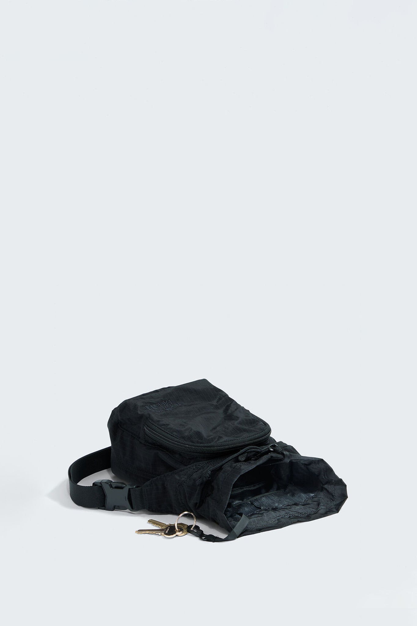 Never Stop Bucket Bag TNF Black